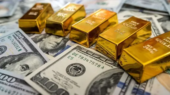 Gold Prices Drop as Dollar Rises Amid Iran Tensions