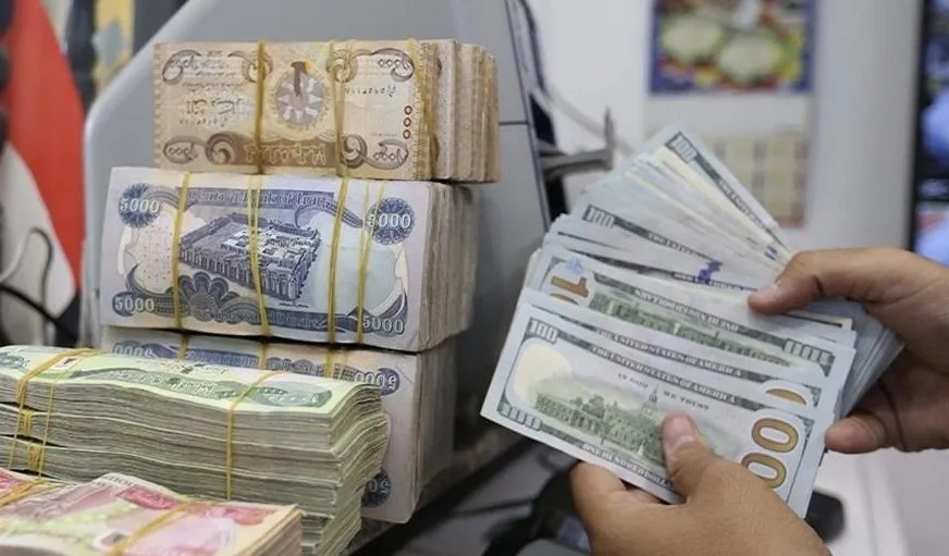 أسعار الدولار بالعراق تقترب من 158 ألف دينار